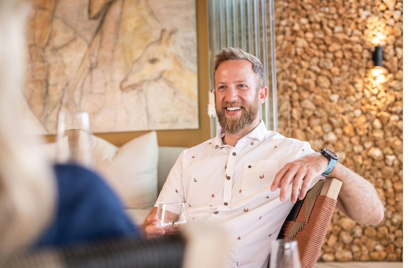 Confident founder in conversation